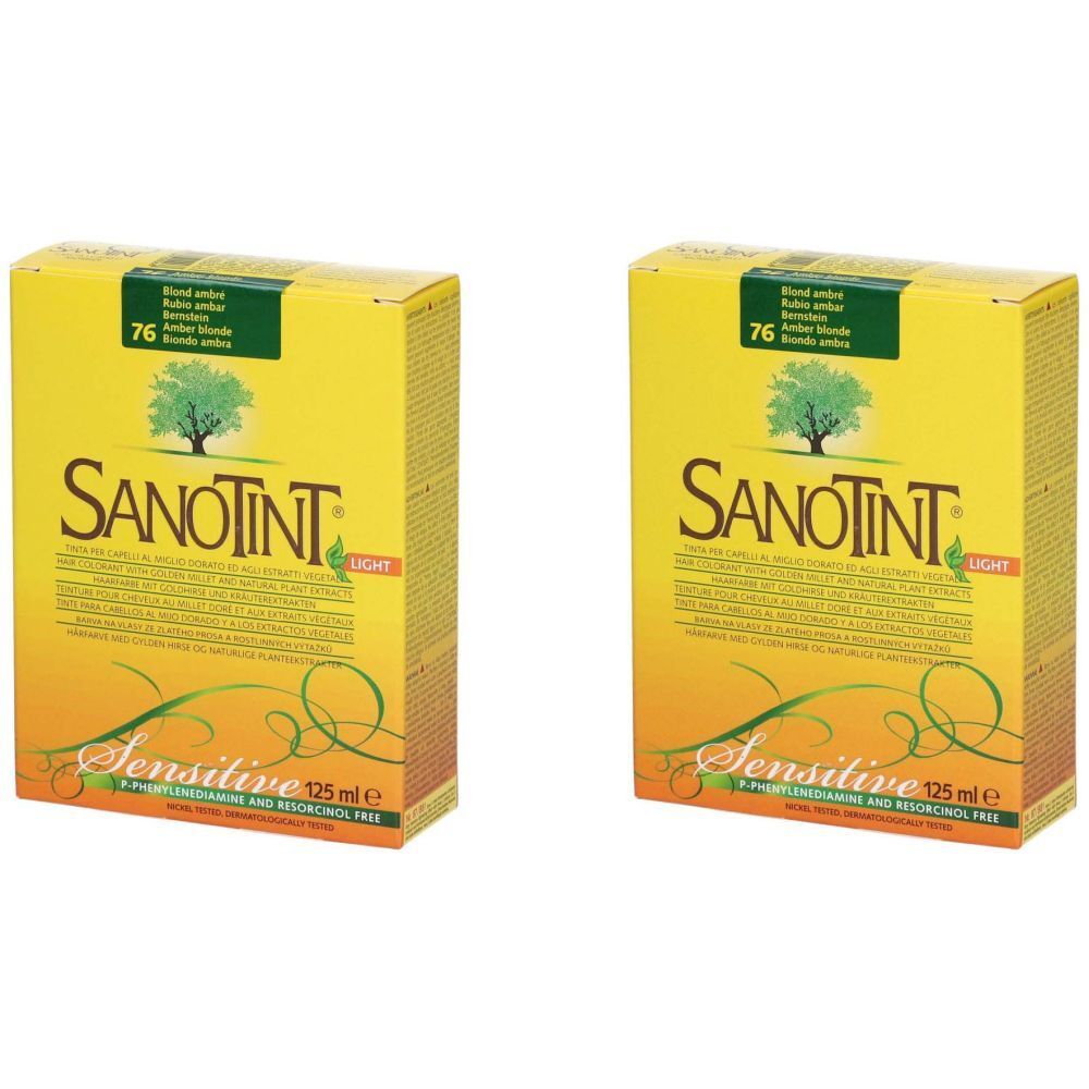 Deux boîtes jaunes SANOTINT, n° 76 Ambre. Inscription: Sensitive, 125 ml. Emballage vert et jaune avec logo arbre.