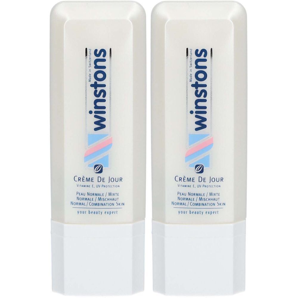 Deux flacons blancs de crème de jour winstons. Inscription : Crème de Jour, pour peaux normales à mixtes. Avec protection UV.