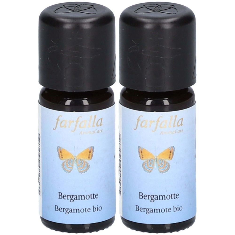 Deux petites bouteilles en verre avec bouchons noirs. L'étiquette indique "farfalla" et "Bergamotte bio".