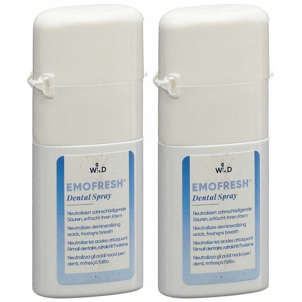 Deux flacons blancs de spray dentaire EMOFRESH avec étiquettes bleues. Inscription: EMOFRESH Dental Spray. Avec bouchon blanc.