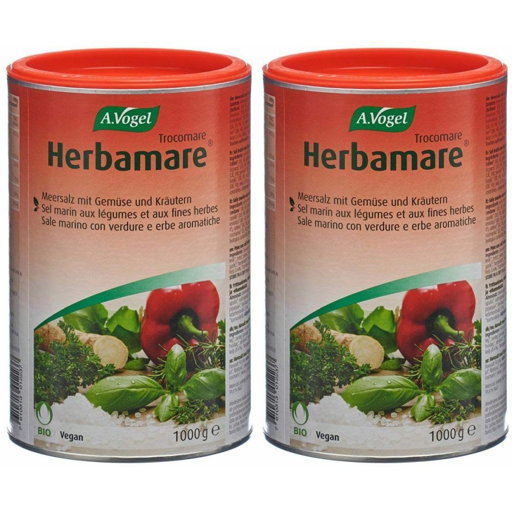 Deux boîtes de sel Herbamare. Couvercles rouges, étiquette avec légumes et texte. Marque A.Vogel.