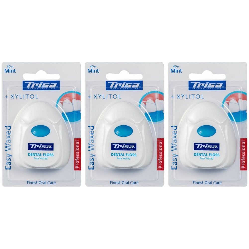 Trois paquets de fil dentaire. Distributeurs blancs avec bouton bleu. Inscription: Trisa, Dental Floss, Xylitol, Easy Waxed.