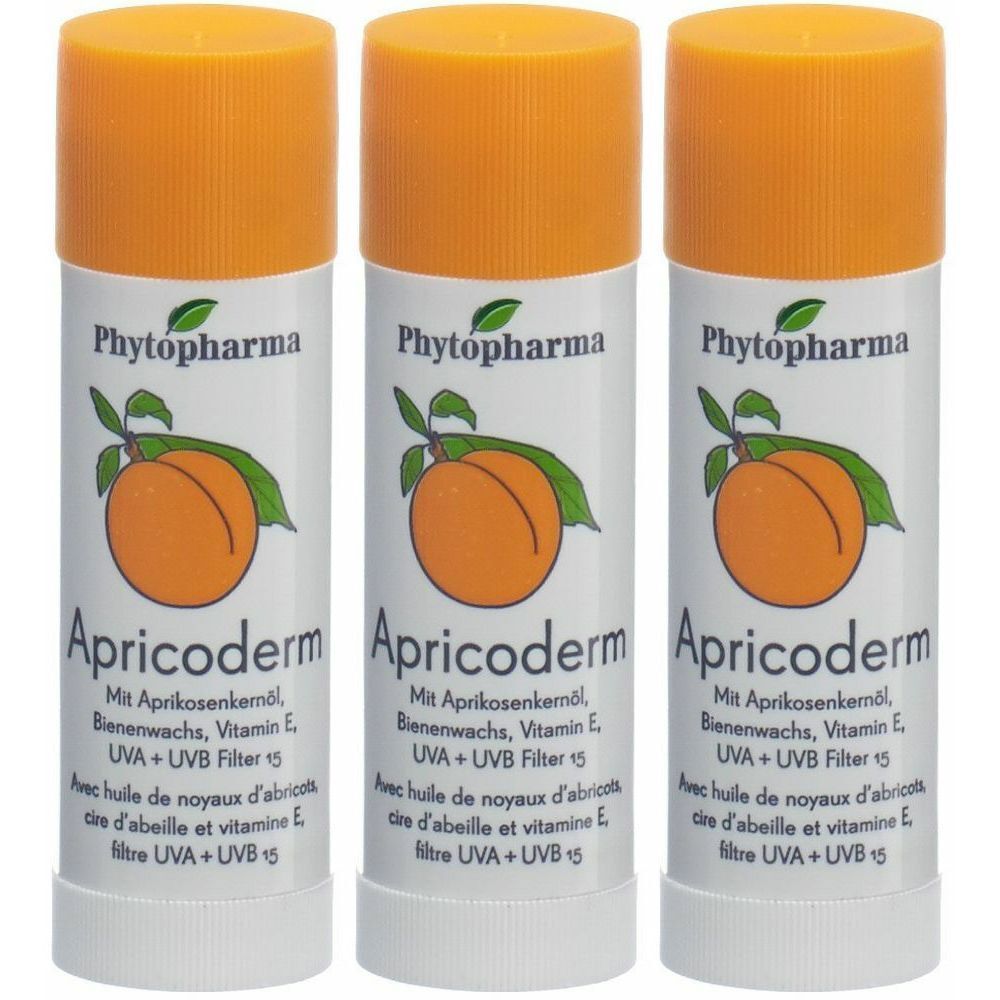 Trois sticks à lèvres avec bouchons orange. Inscription: Phytopharma, Apricoderm, avec huile de noyaux d'abricot, filtre UVA+UVB 15.
