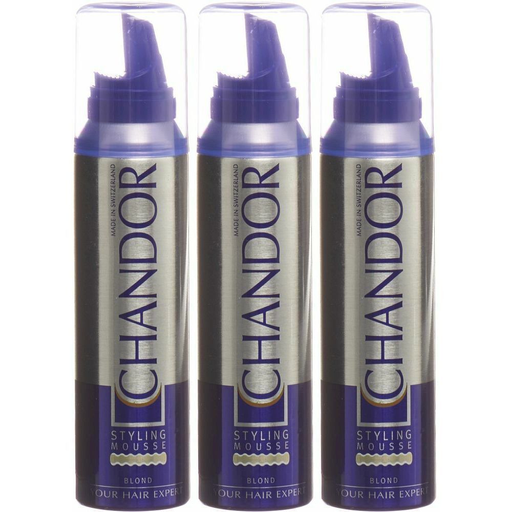 Trois flacons de mousse coiffante CHANDOR. Récipients argentés avec bouchon bleu et inscription. « Blond » et « Styling Mousse » sont visibles.