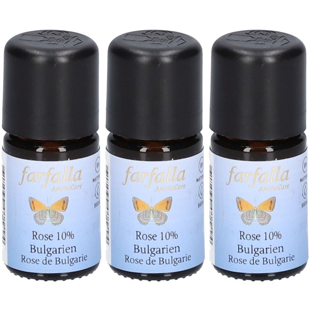 Trois petits flacons avec bouchons noirs. L'étiquette indique "farfalla", un papillon et "Rose 10% Bulgarien".