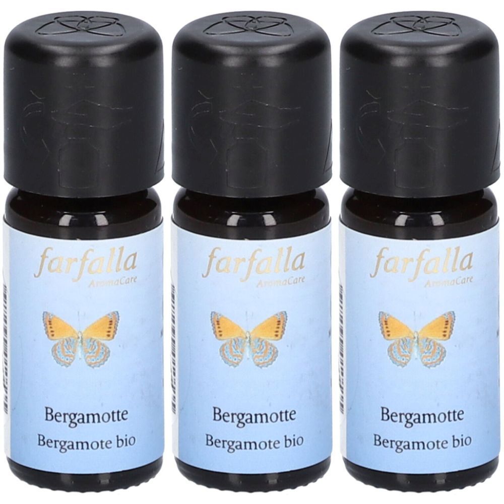 Trois petites bouteilles en verre avec bouchons noirs. Les étiquettes indiquent "farfalla", un papillon et "Bergamotte bio".