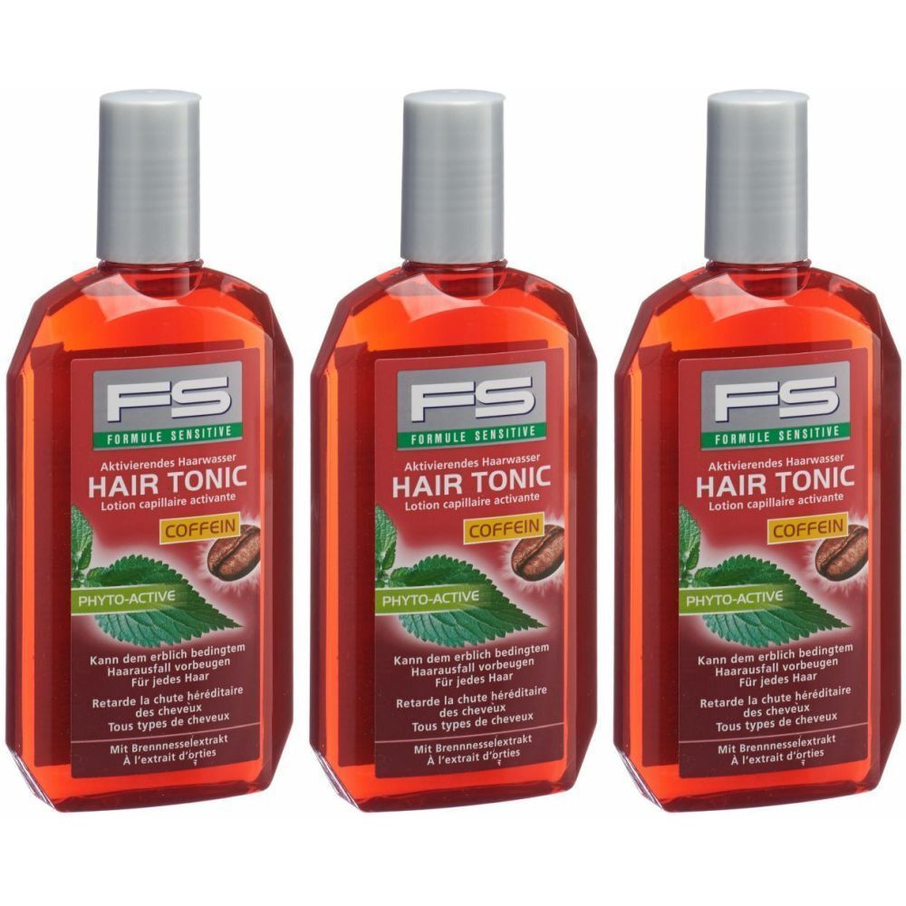 Trois flacons de FS Hair Tonic. Liquide rouge dans des flacons transparents avec des bouchons argentés. Inscription : Hair Tonic, Coffein.