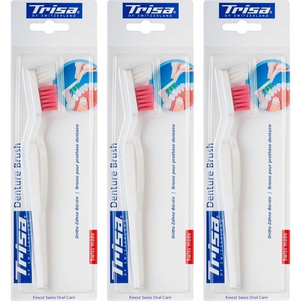 Trois brosses à dents pour prothèses en emballage blister. Manches blancs, soies roses. Marque : Trisa.