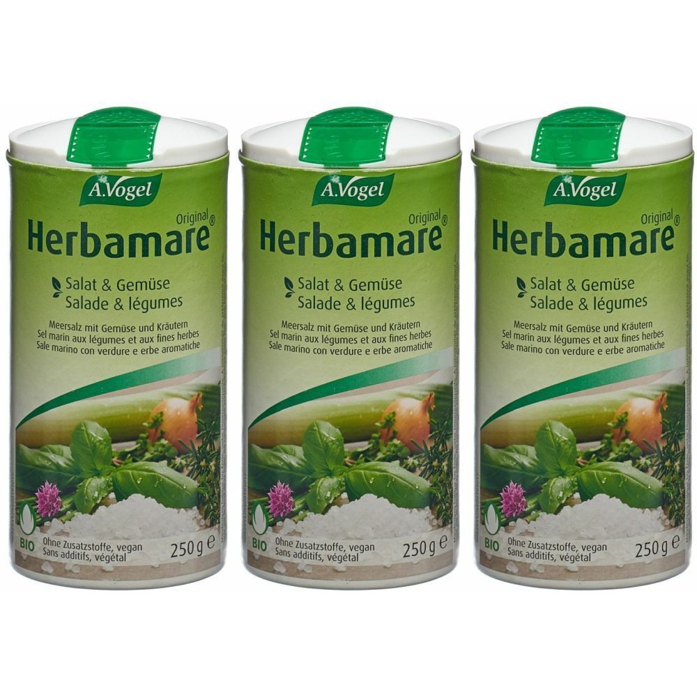 Trois boîtes de sel Herbamare. Emballage vert et blanc avec nom du produit et illustration de légumes. Label bio.