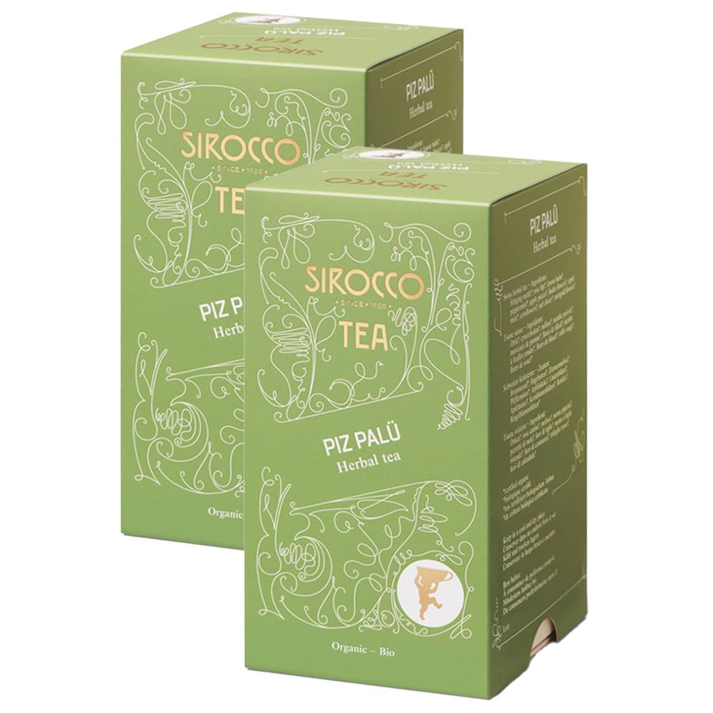 Deux boîtes vertes de thé aux herbes SIROCCO TEA Piz Palü. Écriture et illustrations blanches. Certification biologique.