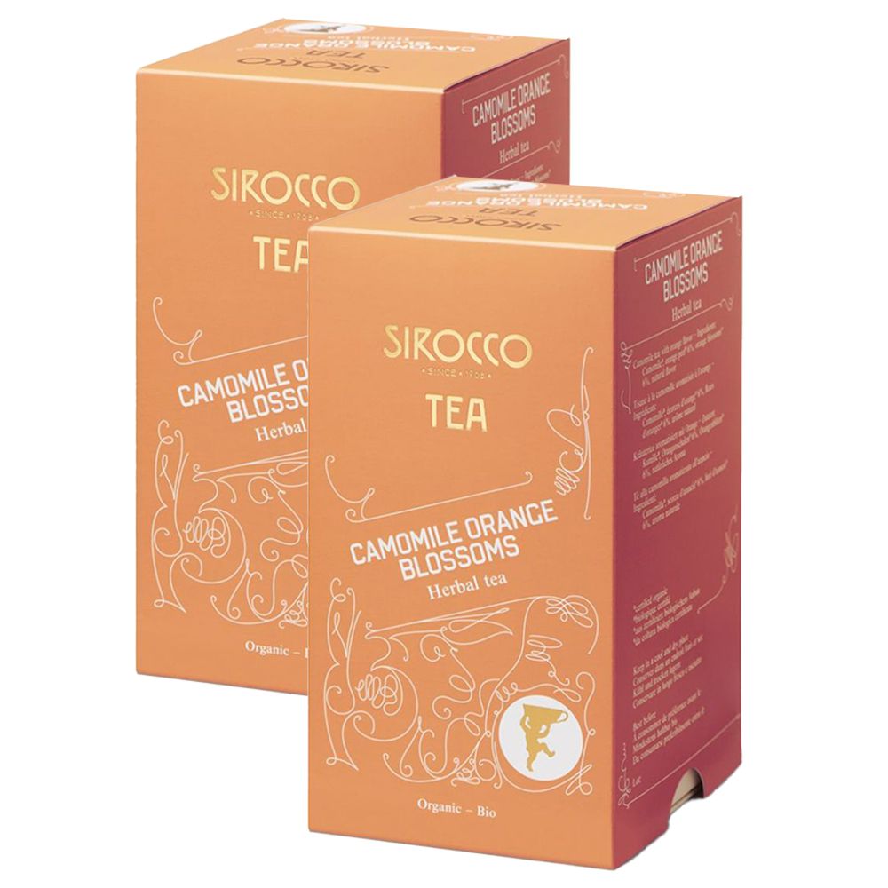 Deux boîtes de thé. Inscription : SIROCCO TEA, Camomille Orange Fleurs, tisane. Fond orange avec ornements blancs et logo.