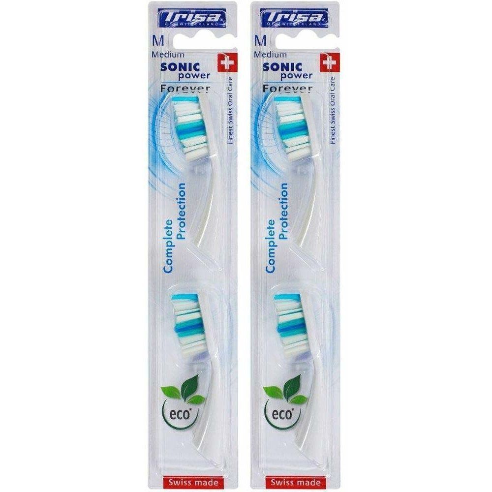 Deux têtes de brosse à dents de rechange dans un emballage. Marque Trisa, modèle Sonic Power. Soies bleues, vertes et blanches. Medium.