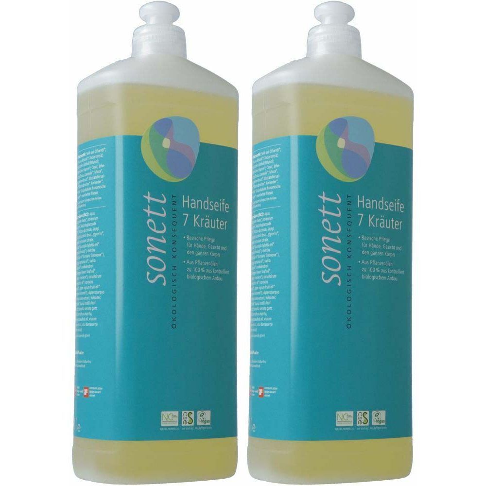 Deux flacons de savon pour les mains aux 7 herbes. Inscription : sonett, Handseife 7 Kräuter. Avec étiquettes bleues et blanches et pompes blanches.
