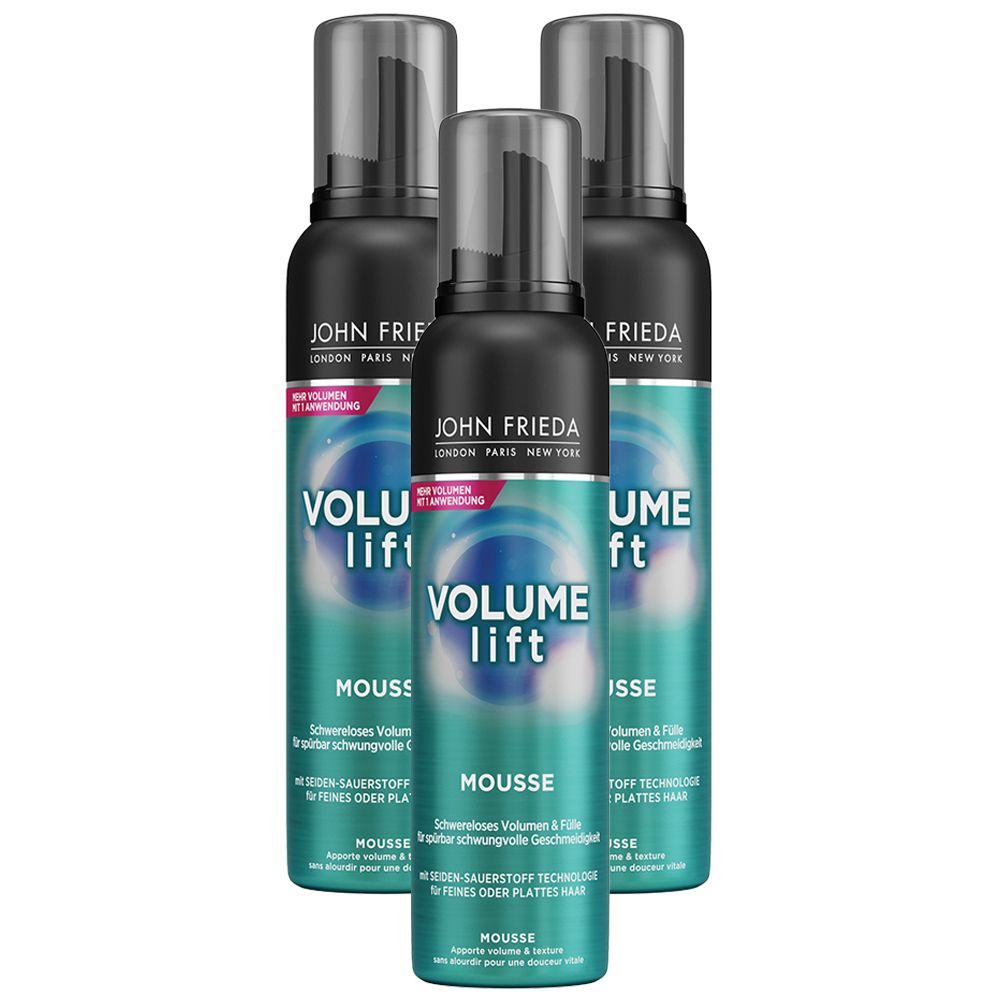 Trois flacons de mousse volumisante JOHN FRIEDA. Bouchons noirs, étiquettes turquoise avec texte blanc. Nom du produit et marque visibles.
