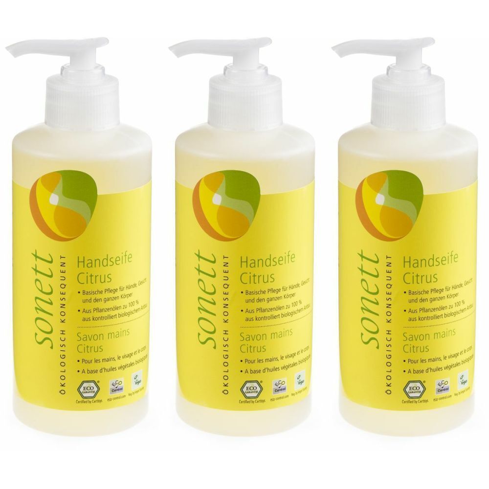 Trois flacons avec pompe blanche et étiquette jaune. Inscription : Handseife Citrus, sonett. Avec label bio.