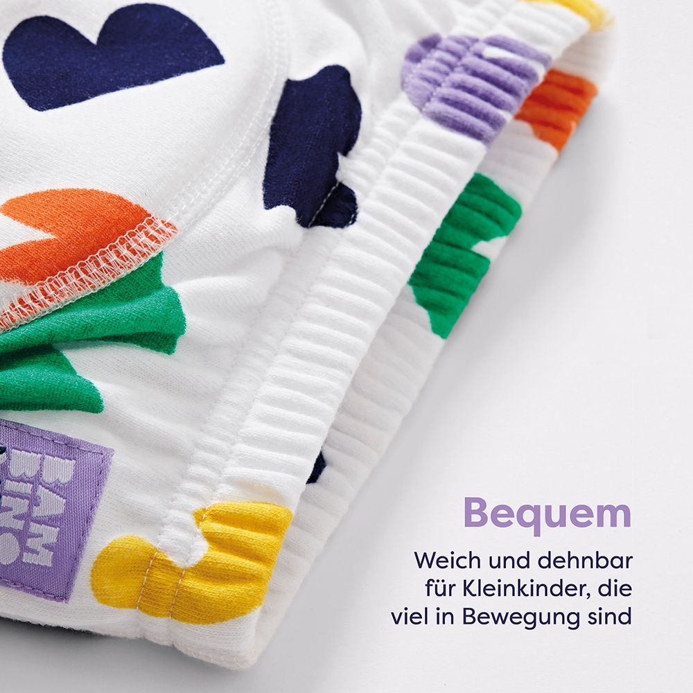 Gros plan sur des culottes d'apprentissage. Texte : Confortable. Doux et extensible pour les tout-petits. Marque : Bambino Mio.