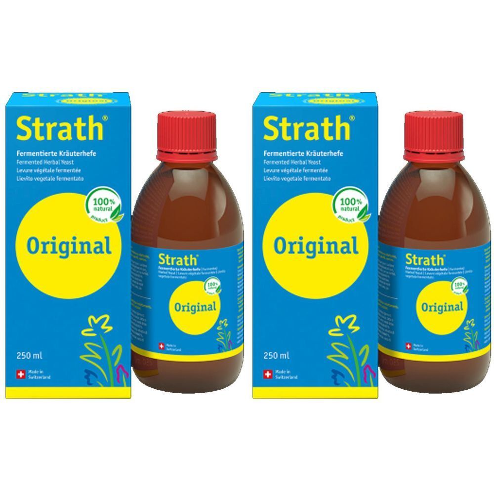 Deux bouteilles et deux boîtes de "Strath Original". Bouteilles avec bouchon rouge, boîtes bleues avec cercle jaune.