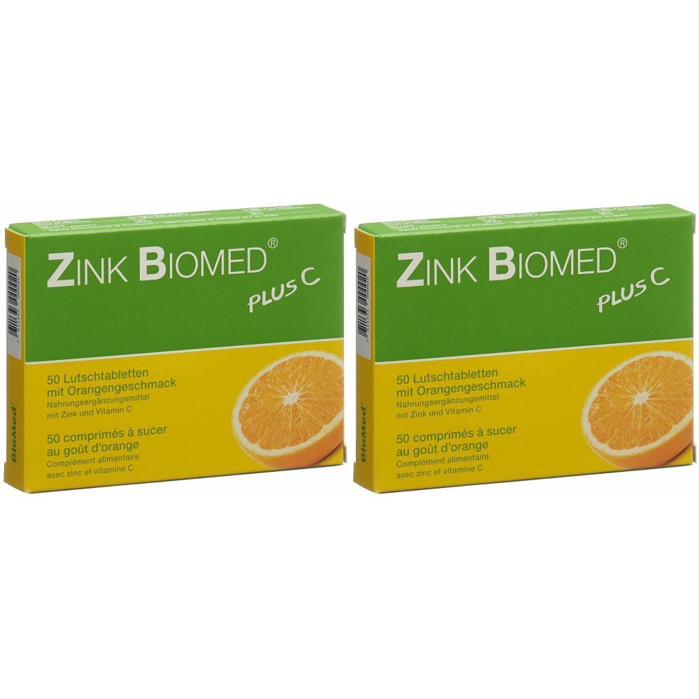 Deux boîtes de Zink Biomed Plus C comprimés à sucer. Emballage vert et jaune avec image d'orange et informations.