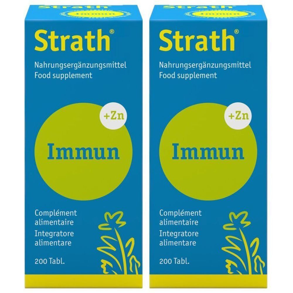 Deux boîtes bleues "Strath Immun + Zinc". Texte: Complément alimentaire, Immun, 200 Tabl. Cercle jaune avec "+Zn".