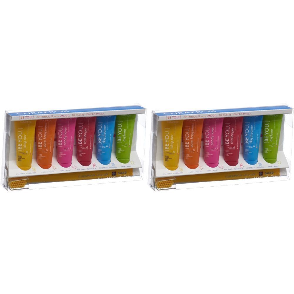 Ensemble de dentifrices avec 6 tubes de couleurs variées et une brosse à dents, dans un emballage transparent.