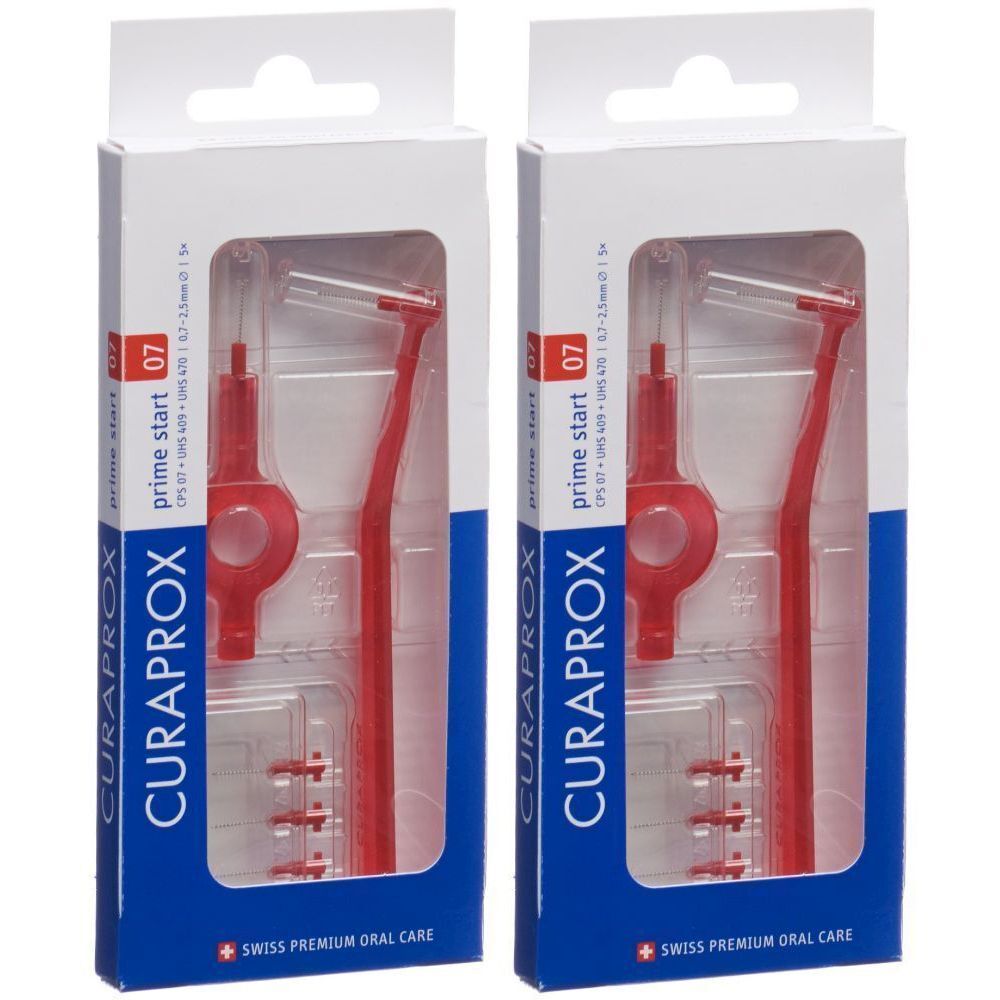 Deux boîtes de brossettes interdentaires CURAPROX Prime Start rouges. Chaque boîte contient des brosses et des supports dans un emballage transparent.