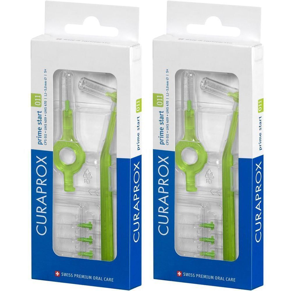 Deux boîtes de brosses interdentaires vertes. Emballage avec le nom du produit CURAPROX et la désignation prime start 011.