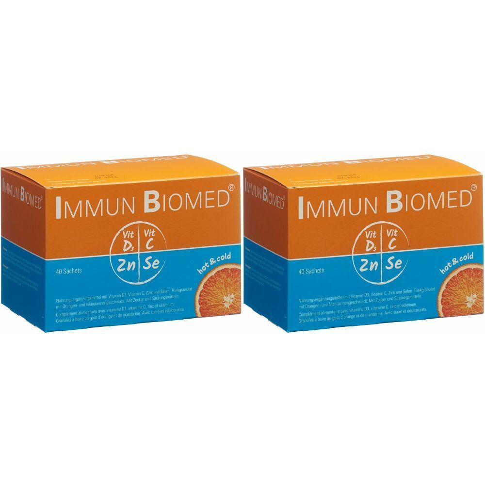 Deux boîtes orange avec IMMUN BIOMED. Inscription : Vit D, C, 2n Se. Motif d'une tranche d'orange.