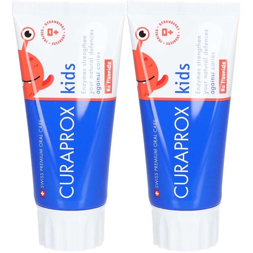 Deux tubes de dentifrice pour enfants. Tubes bleus avec motif de dessin animé rouge et texte CURAPROX kids. Sans fluor.