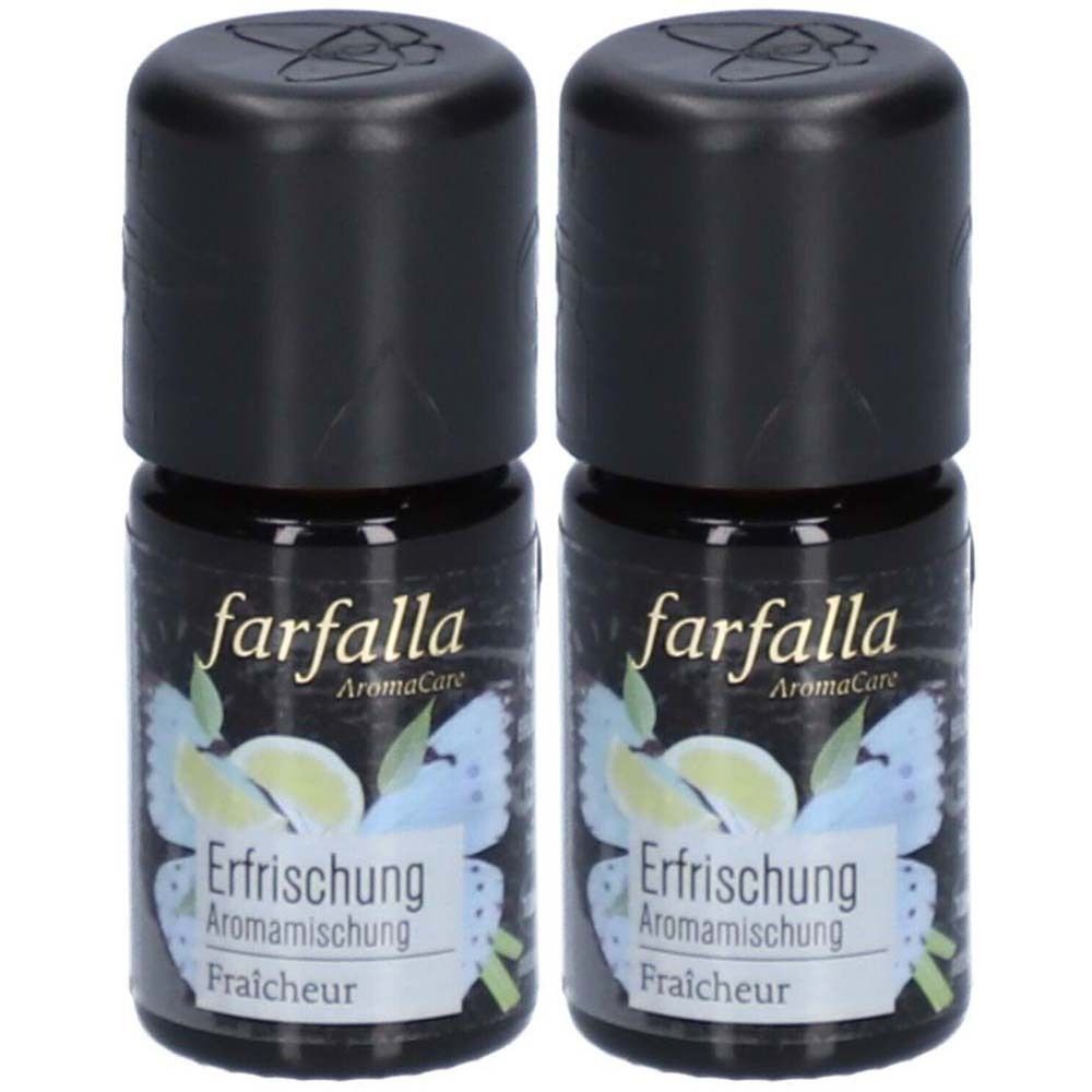 Deux petites bouteilles avec bouchons noirs. L'étiquette indique "farfalla" et "Erfrischung".
