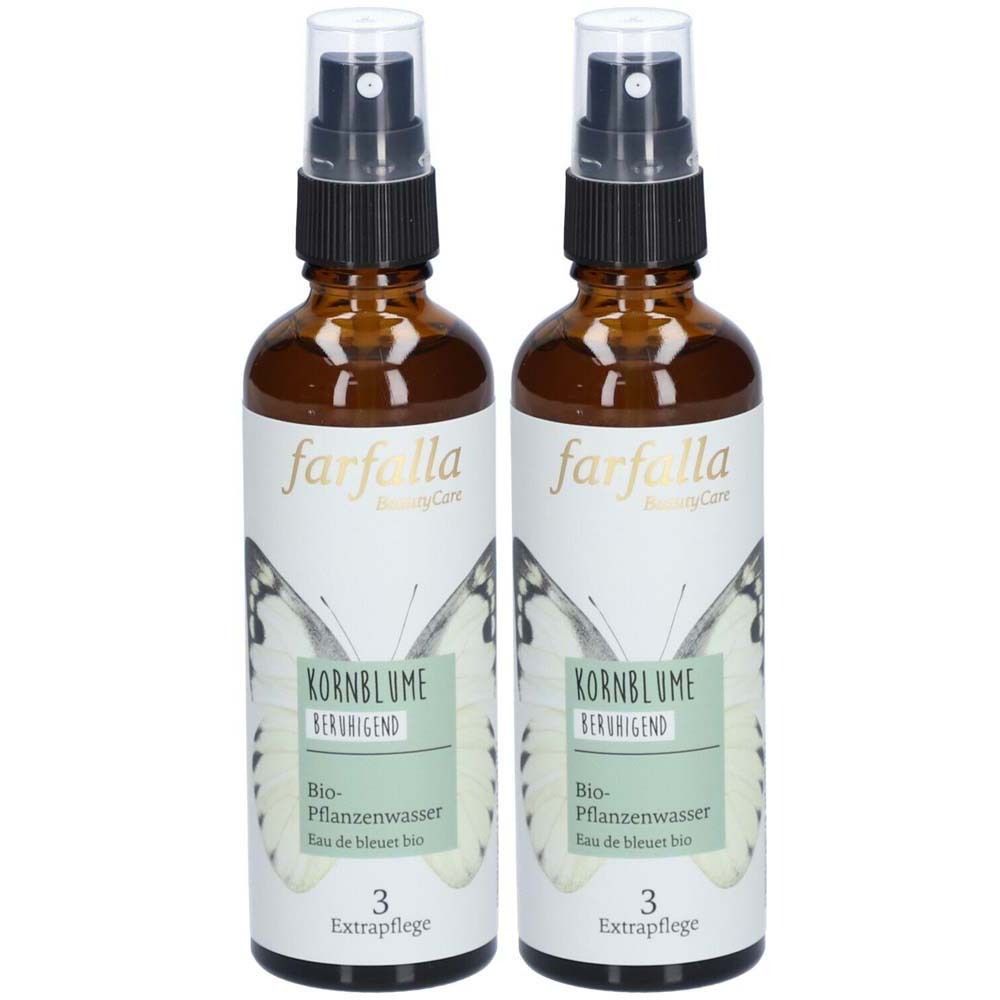 Deux flacons en verre brun avec vaporisateur. Les étiquettes indiquent "farfalla", "Kornblume" et "Bio-Pflanzenwasser".