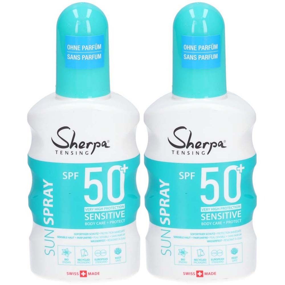 Deux flacons de crème solaire. Blanc, bleu et turquoise. Inscription : Sherpa Tensing, SPF 50+, sans parfum. Swiss Made.