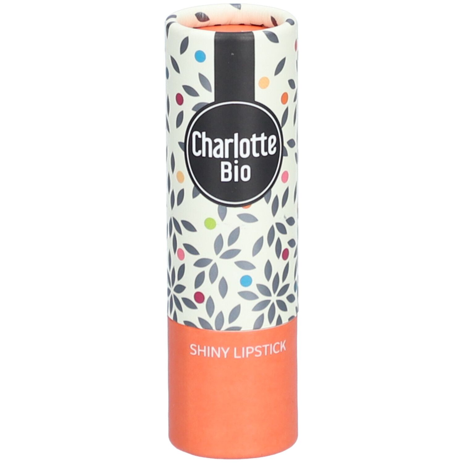 Emballage de rouge à lèvres. Forme cylindrique, imprimé floral. Marque Charlotte Bio, inscription Shiny Lipstick.