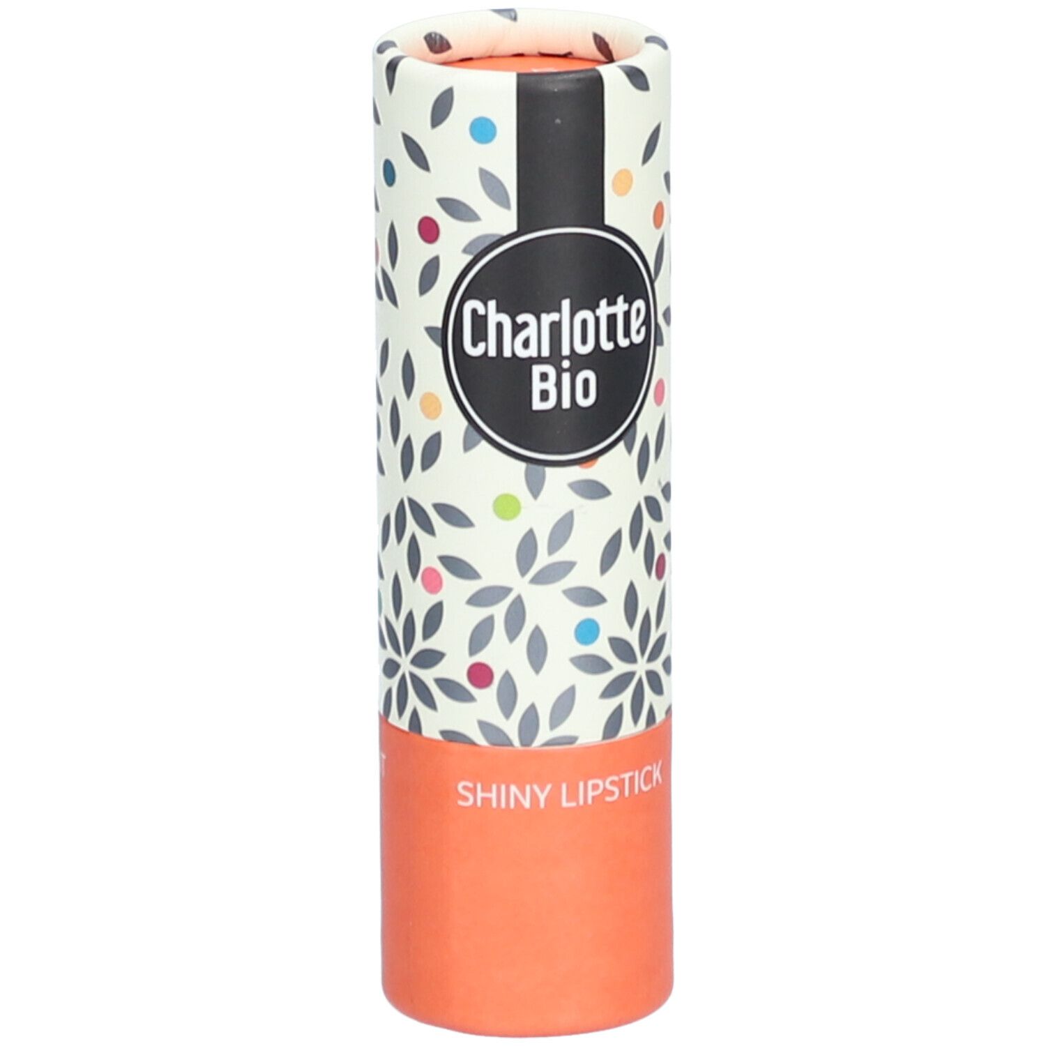 Emballage de rouge à lèvres. Forme cylindrique, imprimé floral. Marque Charlotte Bio, inscription Shiny Lipstick.