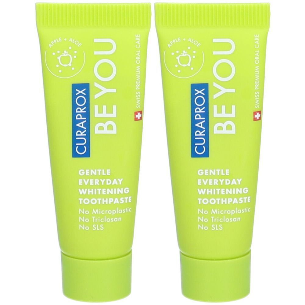 Deux tubes de dentifrice vert. Inscription : CURAPROX BE YOU, GENTLE EVERYDAY WHITENING TOOTHPASTE. Croix suisse.