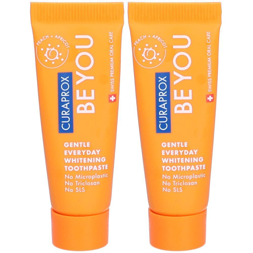 Deux tubes de dentifrice orange avec texte blanc. Inscriptions: CURAPROX, BEYOU, GENTLE EVERYDAY WHITENING TOOTHPASTE. Logo et mentions.