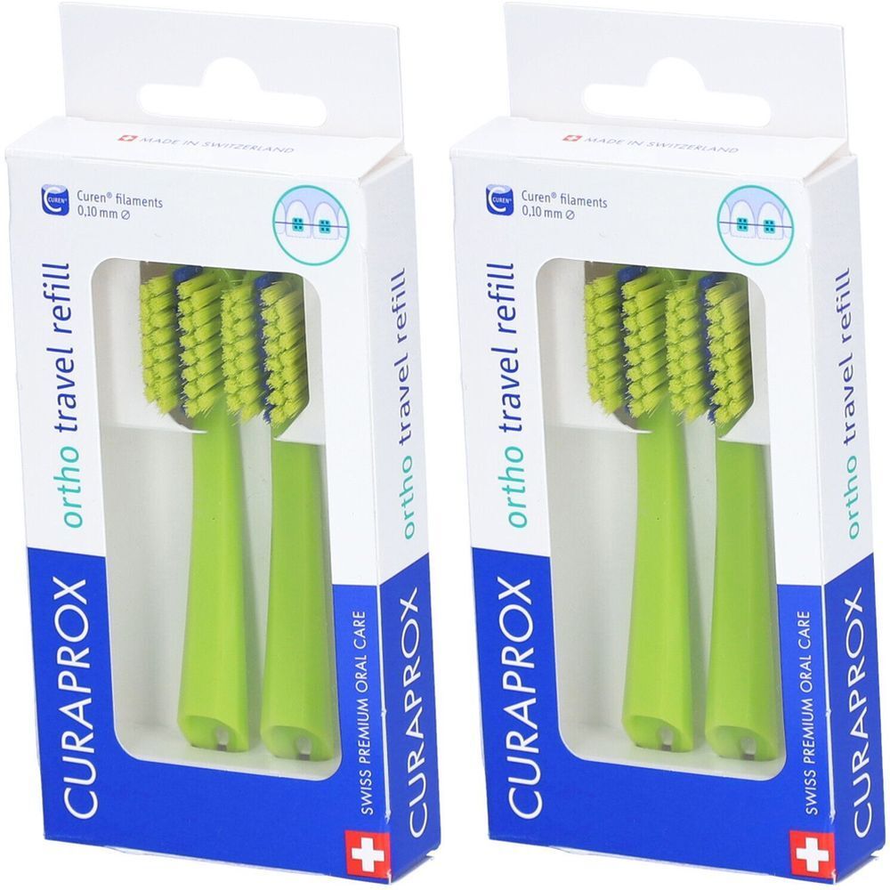 Deux paquets de recharges de brosses à dents vertes. Inscription : CURAPROX, ortho travel refill. Croix suisse.