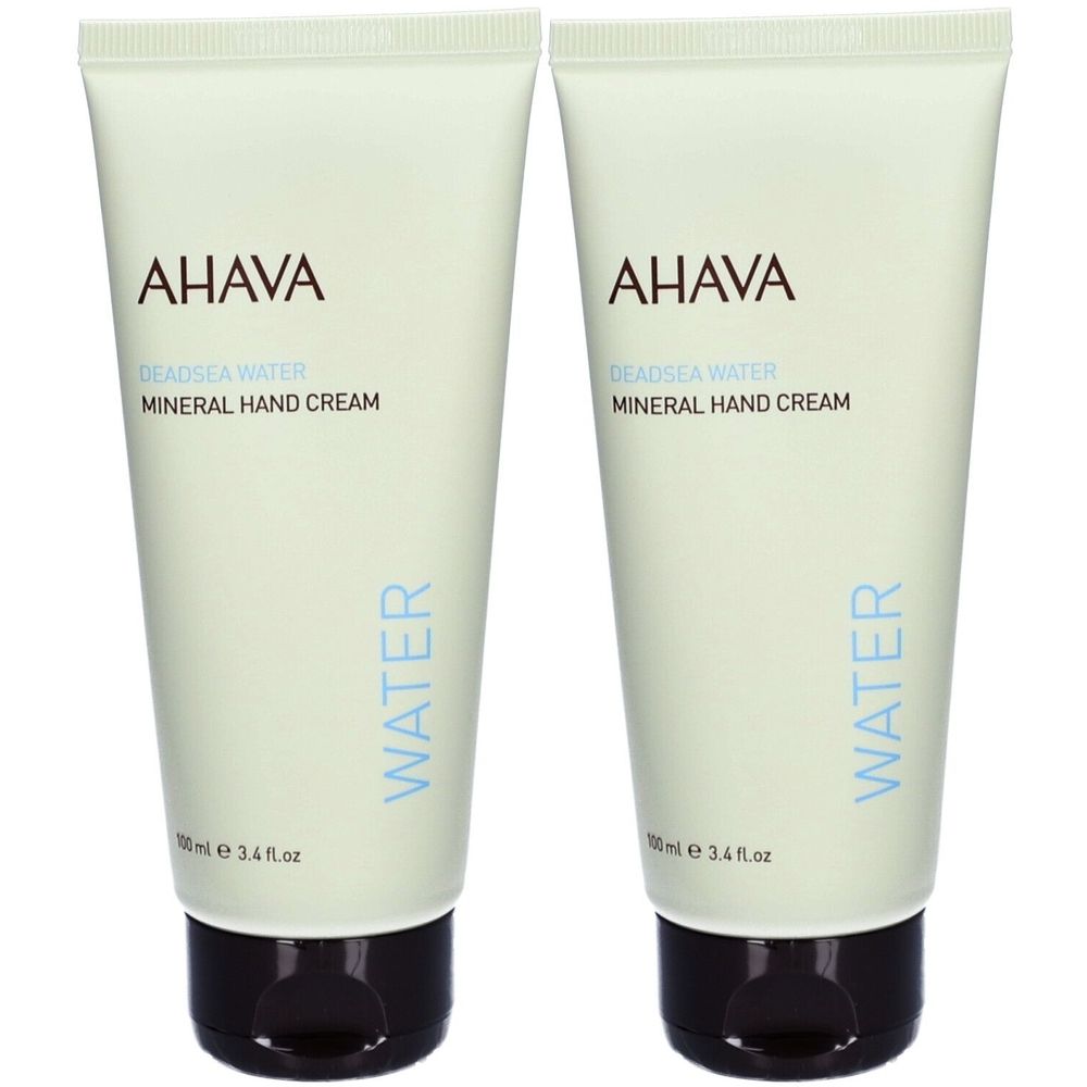 Deux tubes de crème pour les mains AHAVA. Tubes vert clair avec bouchon marron. Inscription : AHAVA, Deadsea Water, Mineral Hand Cream.