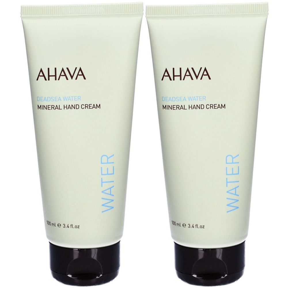 Deux tubes de crème pour les mains AHAVA. Tubes vert clair avec bouchon marron. Inscription : AHAVA, Deadsea Water, Mineral Hand Cream.