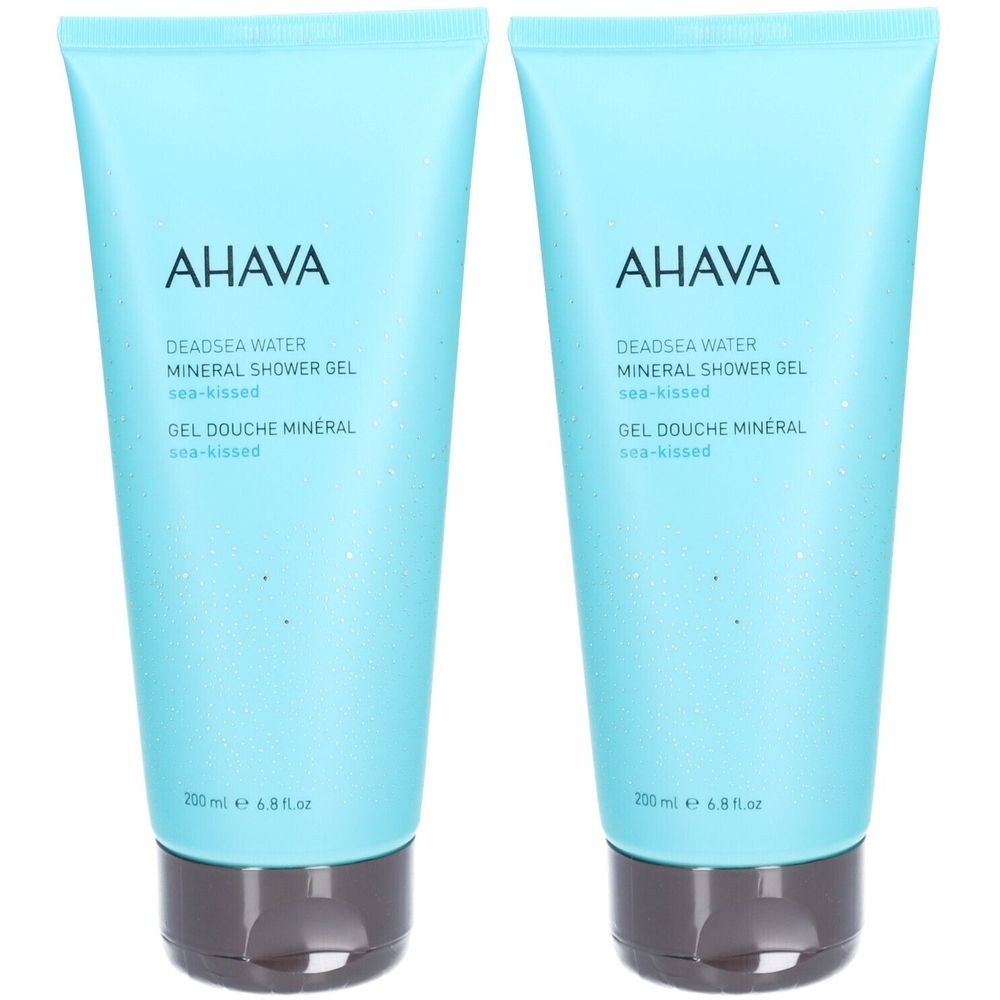 Deux tubes de gel douche minéral AHAVA. Tubes bleu clair avec bouchon noir. Inscription AHAVA et nom du produit.