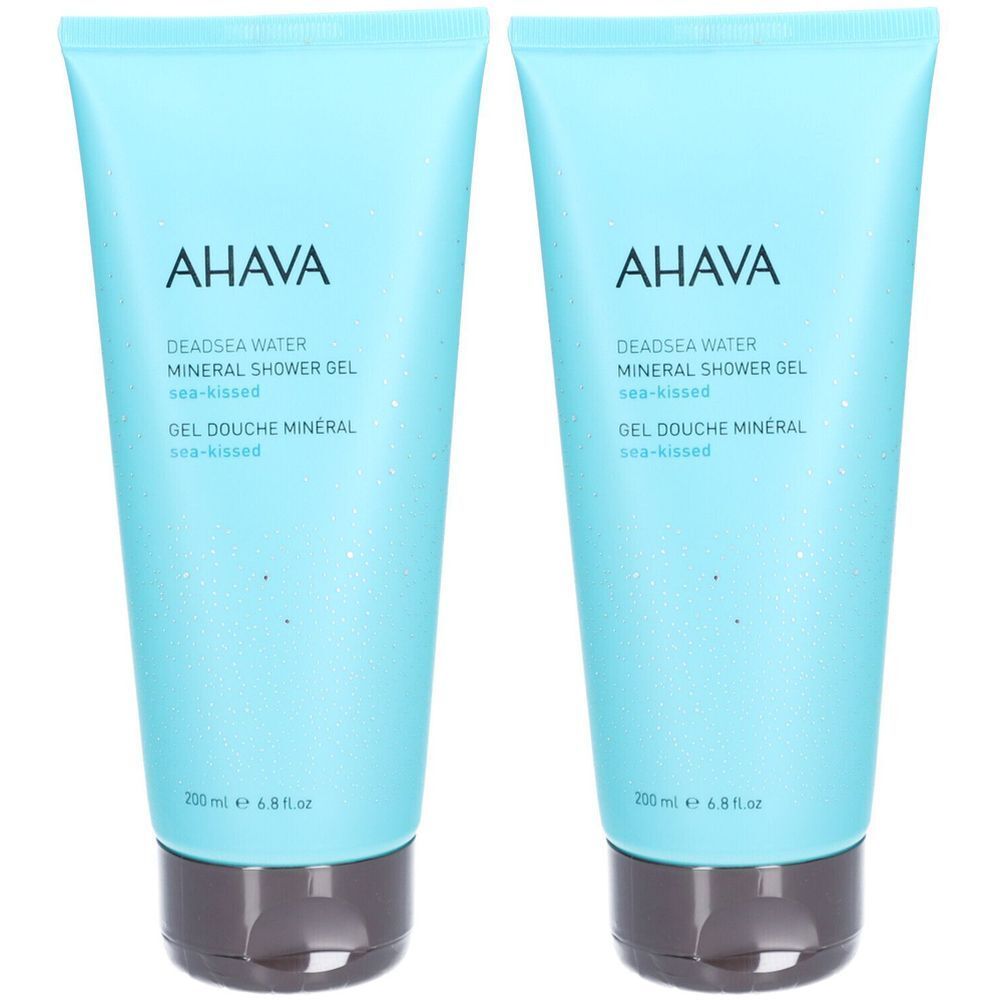 Deux tubes de gel douche minéral AHAVA. Tubes bleu clair avec bouchon noir. Inscription AHAVA et nom du produit.