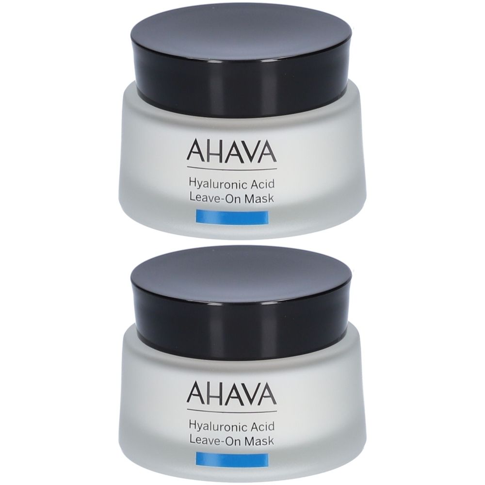 Deux pots AHAVA HYALUR ACID Masque sans rinçage. Récipients en verre avec couvercles noirs. Inscription AHAVA et nom du produit.
