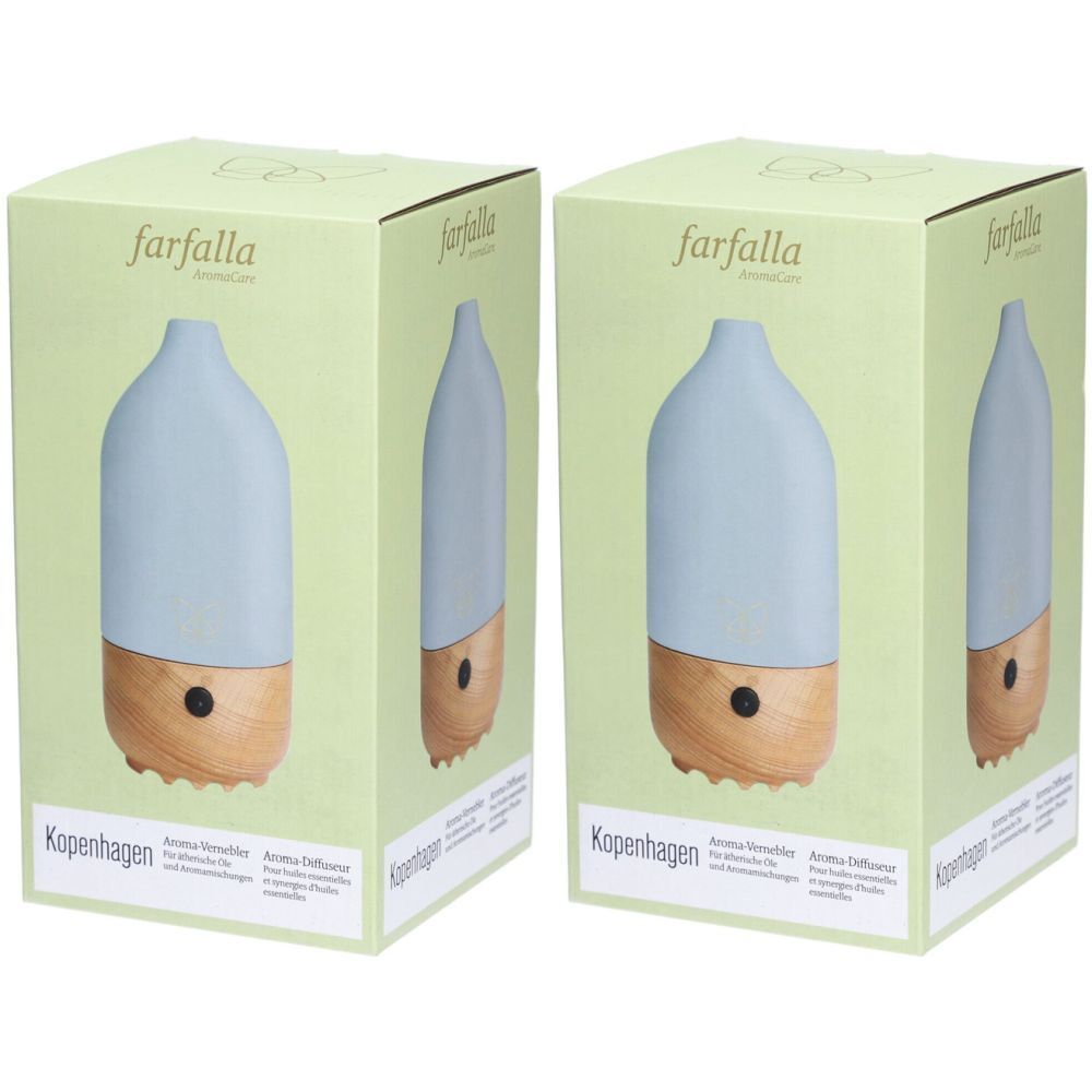 Deux diffuseurs d'arômes dans des boîtes. Parties supérieures bleu clair, bases en bois. Inscription : farfalla, Copenhague.