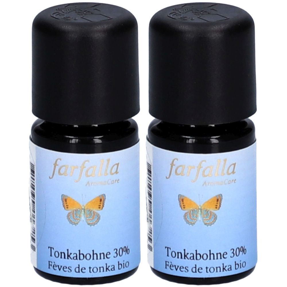 Deux flacons avec bouchons noirs. Étiquettes : "farfalla AromaCare", "Tonkabohne 30%" et "Fèves de tonka bio".