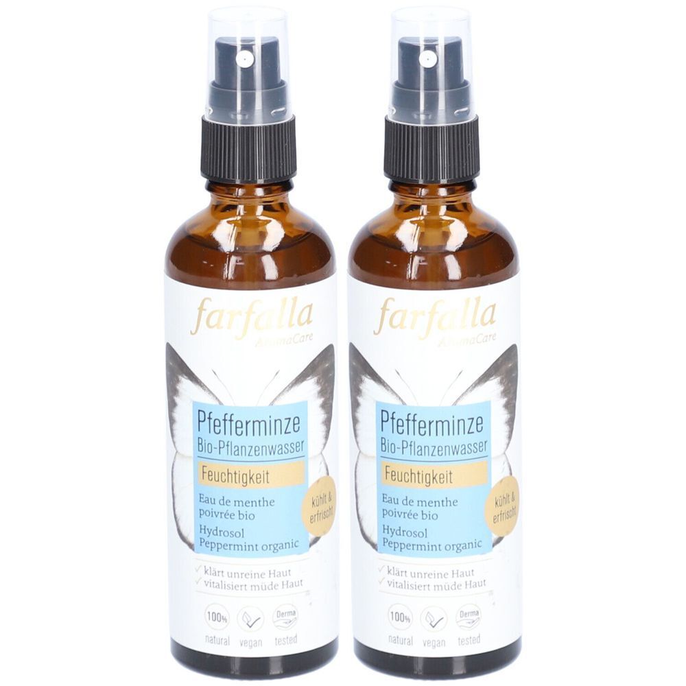 Deux flacons en verre brun avec vaporisateur. Les étiquettes indiquent "farfalla" et "Pfefferminze Bio-Pflanzenwasser".