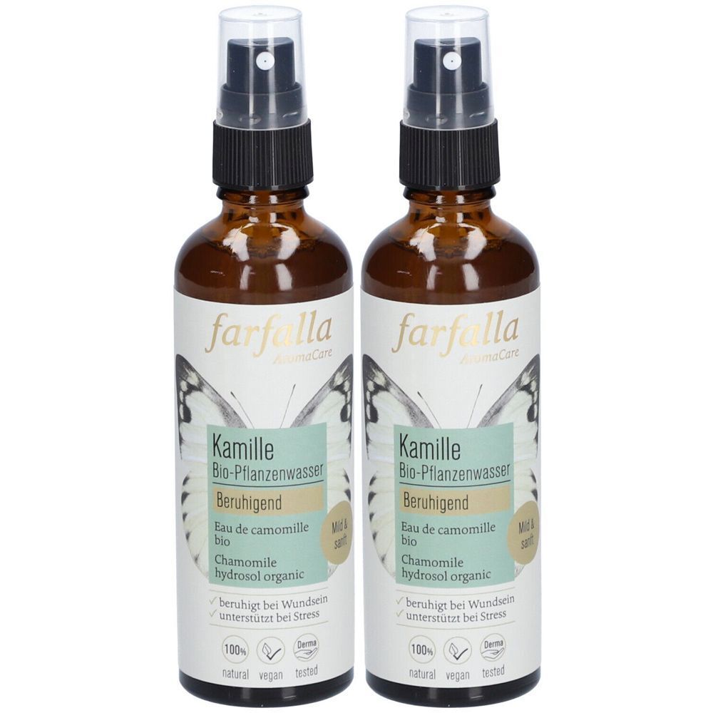 Deux flacons en verre brun avec vaporisateur. Les étiquettes indiquent "farfalla" et "Kamille Bio-Pflanzenwasser".