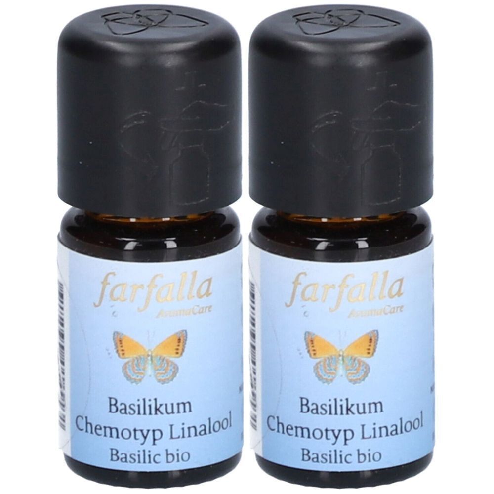 Deux petites bouteilles en verre brun avec des bouchons noirs. Les étiquettes indiquent "farfalla" et "Basilic".