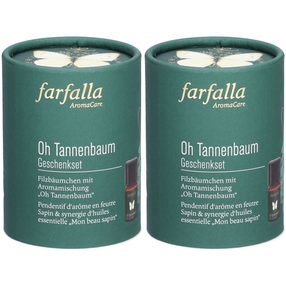 Deux coffrets cadeaux cylindriques verts. Inscription: farfalla AromaCare, Oh Tannenbaum Geschenkset. Contient des arbres en feutre avec mélange aromatique.