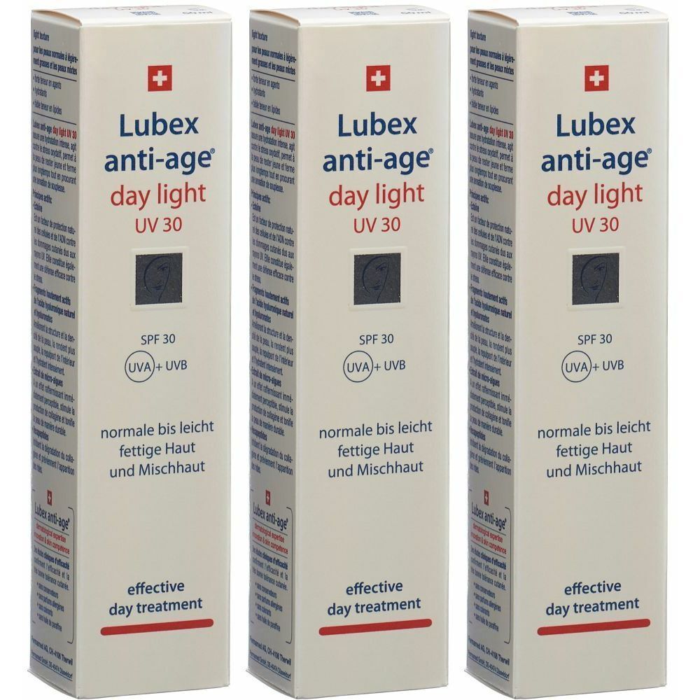 Trois boîtes identiques de Lubex anti-age® day light UV 30. Boîtes blanches avec croix rouge et informations produit.
