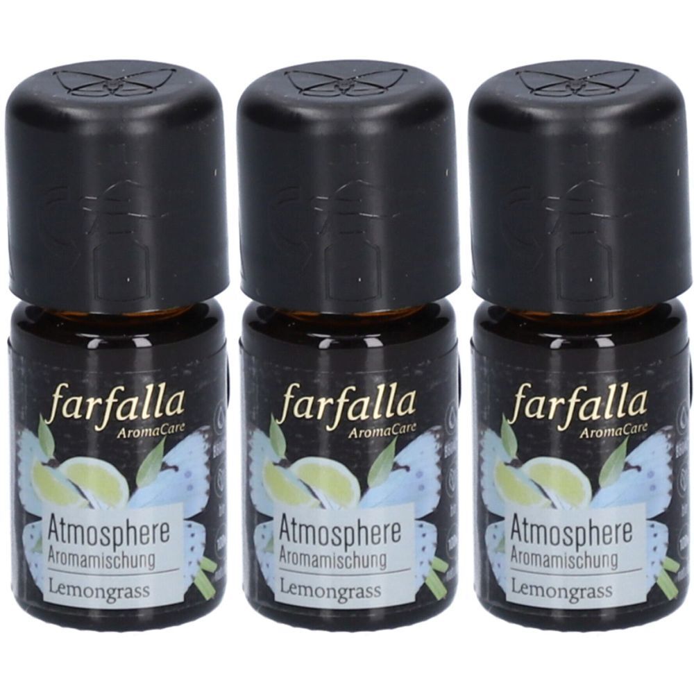 Trois flacons avec bouchons noirs. Les étiquettes indiquent "farfalla", "Atmosphere Aromamischung" et "Lemongrass".