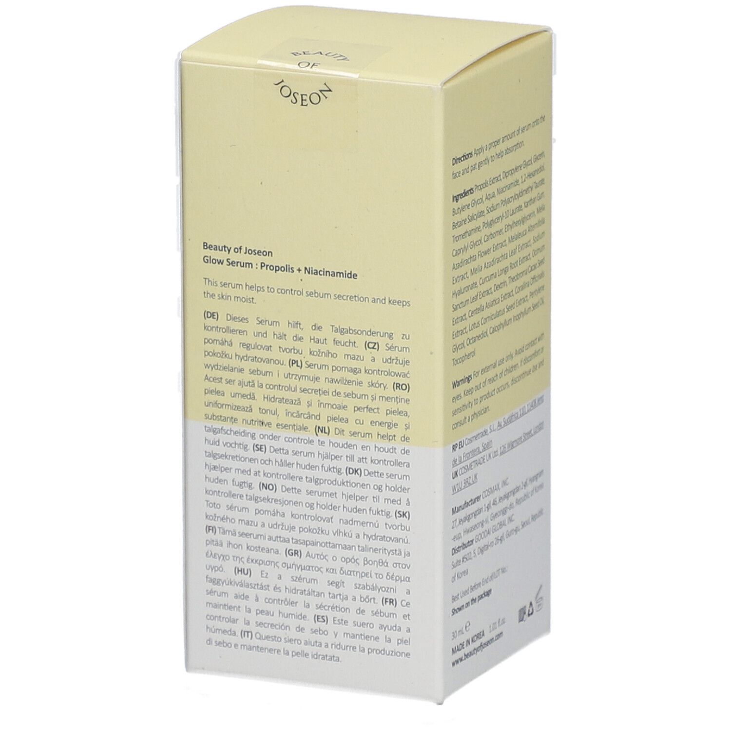 Vue latérale de l'emballage cartonné avec description du produit en plusieurs langues.